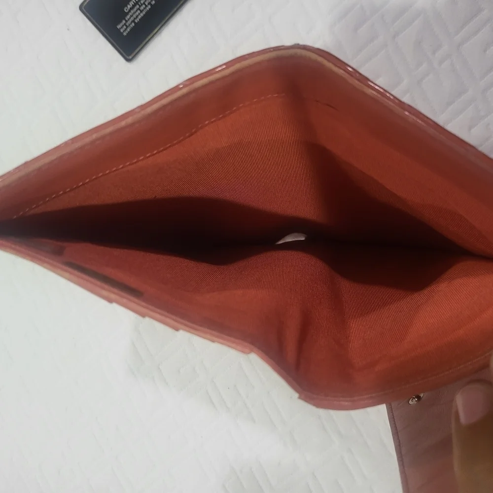 CHANEL Quilted Orange Matelasse Gold CC Logo Patent Leather Long Bifold Wallet.